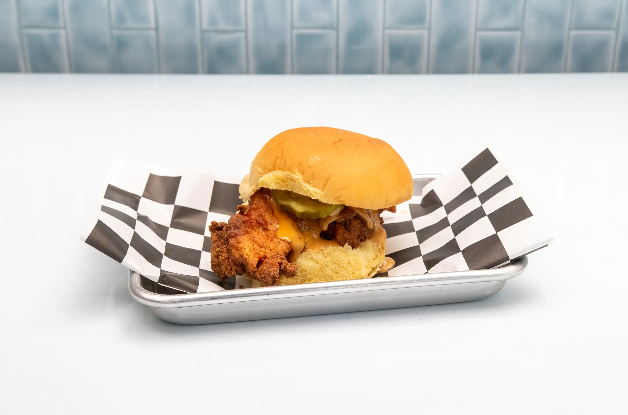The Rusty Classic crispy chicken sandwich with pickles and house sauce at The Rusty Roost