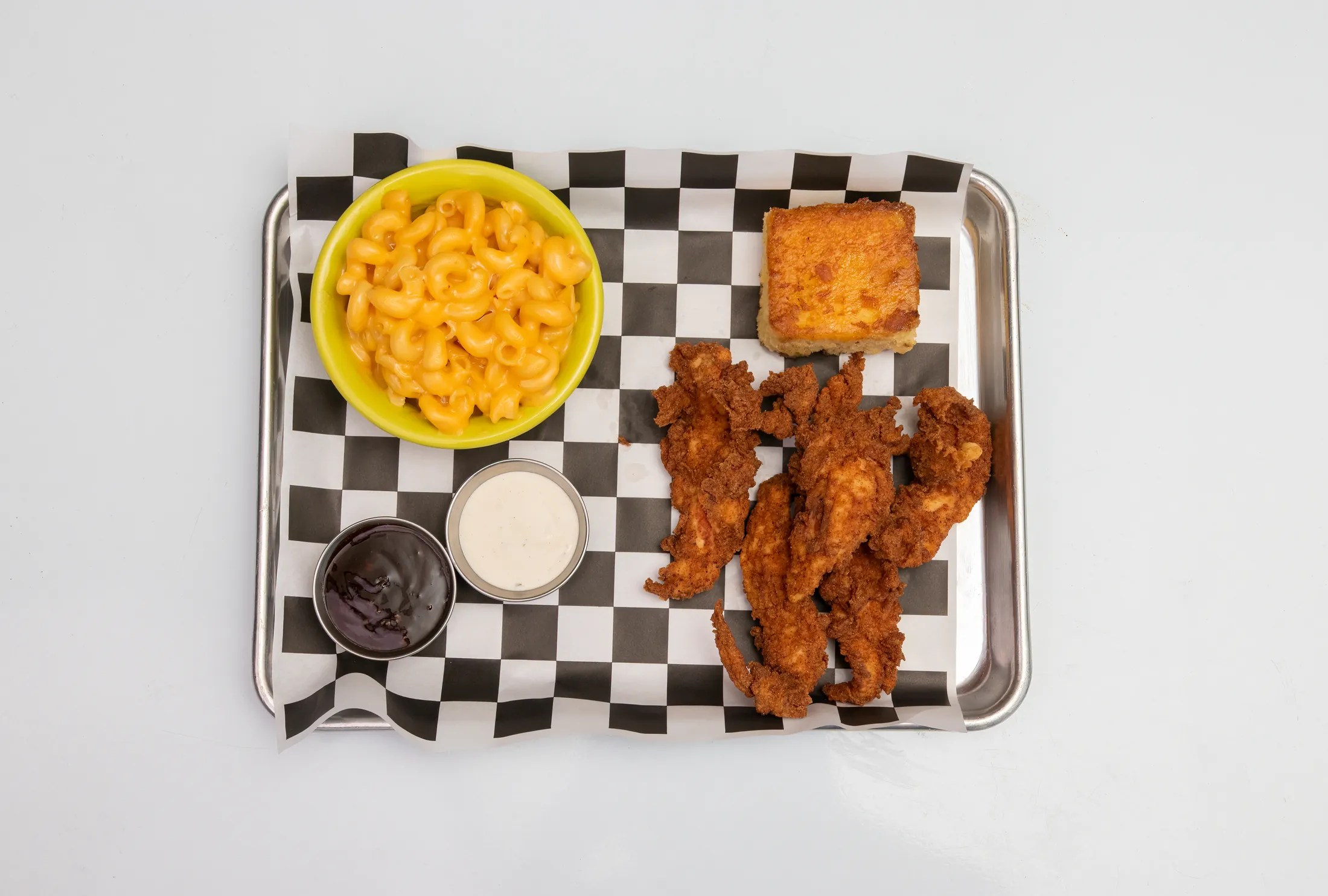 Tender combo with three tenders, a side, and a drink at The Rusty Roost